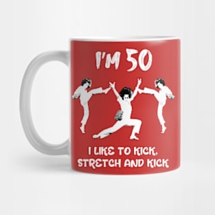 I'm 50 I like to kick, stretch and kick. Sally Omalley Mug